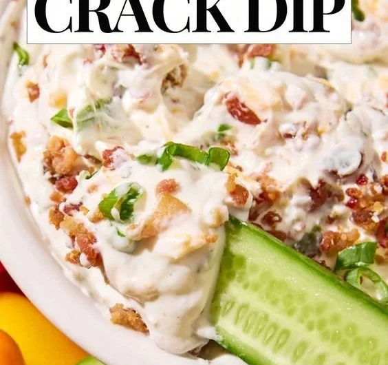 High protein crack dip served in a bowl with fresh vegetables