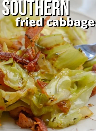 Southern fried cabbage with crispy bacon in a skillet