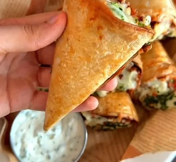 Tortilla cones filled with mixed toppings on a plate