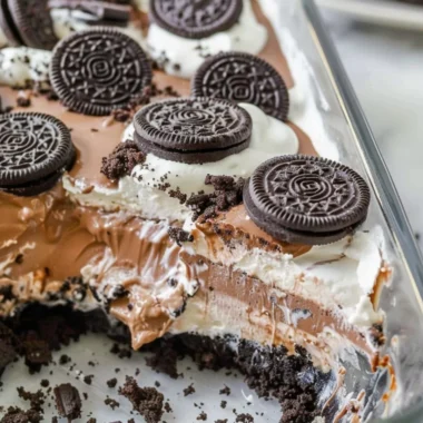 No Bake Oreo Dessert with Cool Whip served in a glass bowl