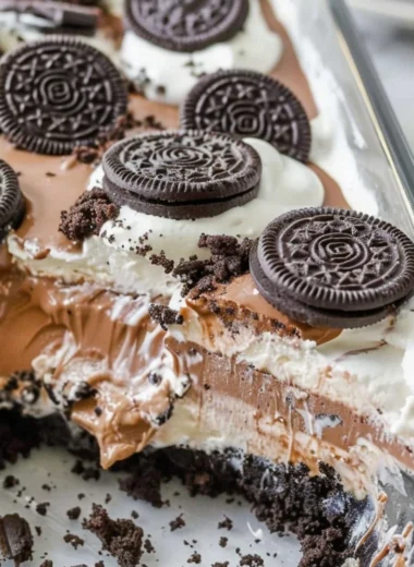 No Bake Oreo Dessert with Cool Whip served in a glass bowl