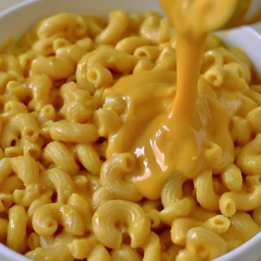 Creamy vegan mac & cheese served in a bowl, dairy-free and cashew-free