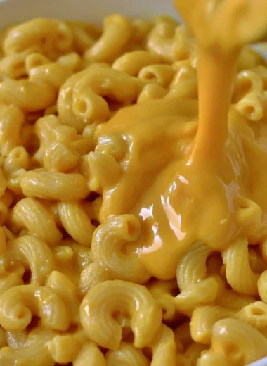 Creamy vegan mac & cheese served in a bowl, dairy-free and cashew-free