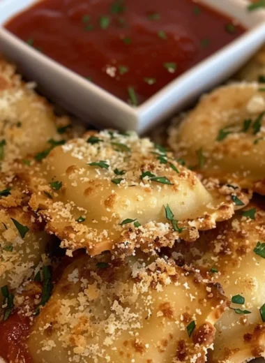 Crispy air fryer ravioli served on a plate with dipping sauce