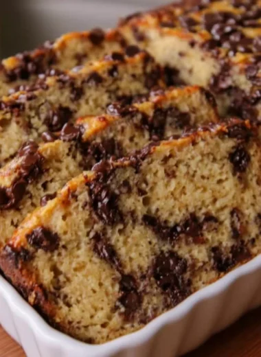 High protein Greek yogurt banana bread with chocolate chip layers on a plate