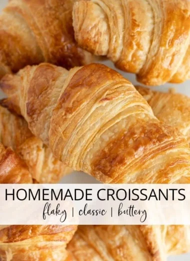 Freshly baked homemade classic croissants on a wooden board