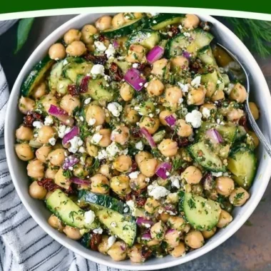 Healthy Mediterranean Chickpea Salad with fresh vegetables and dressing