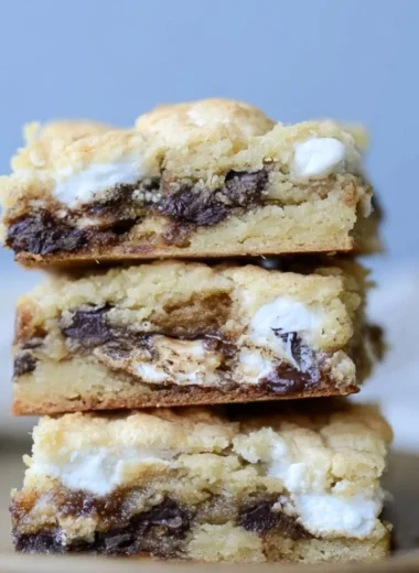 Delicious Mud Hen Bars served on a plate, showcasing their rich and gooey texture.