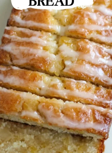 Delicious slice of homemade pineapple bread with fresh pineapple chunks