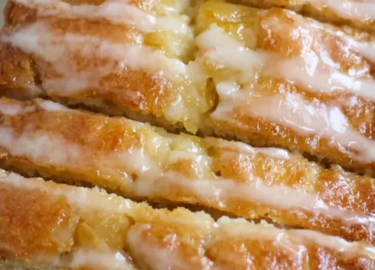 Delicious slice of homemade pineapple bread with fresh pineapple chunks