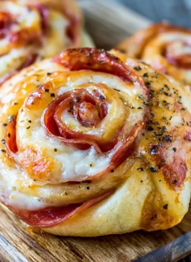 Plate of homemade pizza rolls ready to be served.