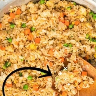 Delicious plate of quick and easy homemade fried rice with vegetables and protein