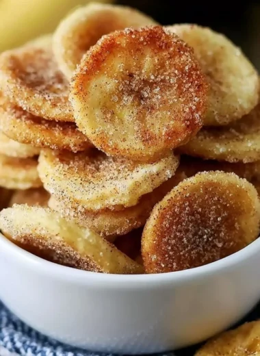 Crispy cinnamon-sugar air fryer banana chips in a bowl for a delicious snack