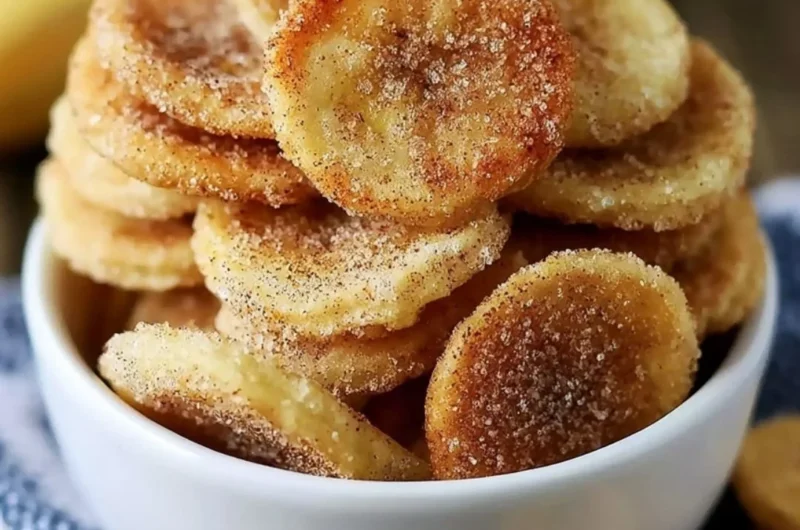 Crispy cinnamon-sugar air fryer banana chips in a bowl for a delicious snack