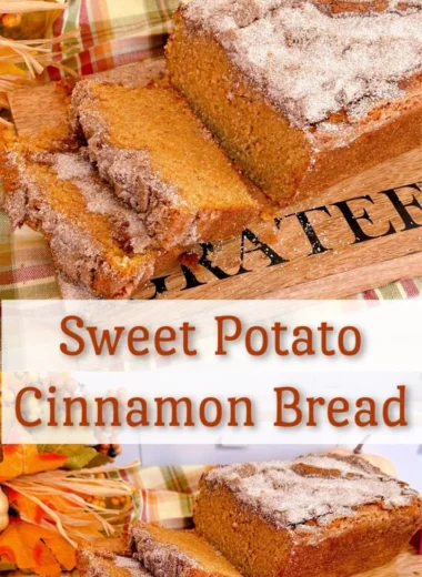 Loaf of homemade sweet potato bread on a wooden cutting board