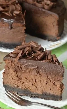 Delicious Triple Chocolate Cheesecake with a crunchy Oreo crust