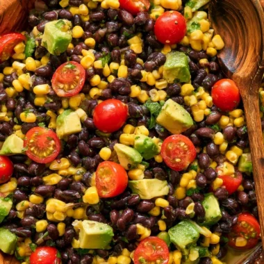 Vegan black bean salad with fresh vegetables and herbs