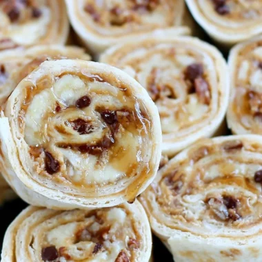 Chocolate chip banana roll ups with peanut butter on a plate