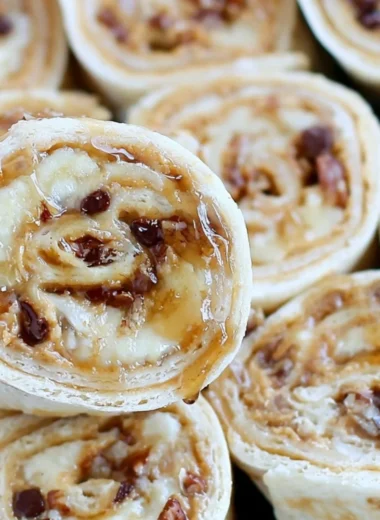 Chocolate chip banana roll ups with peanut butter on a plate