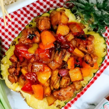 Delicious Blackstone pineapple chicken served with fresh garnishes