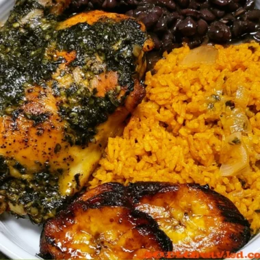 Cozy chicken yellow rice dish garnished with black beans and herbs.