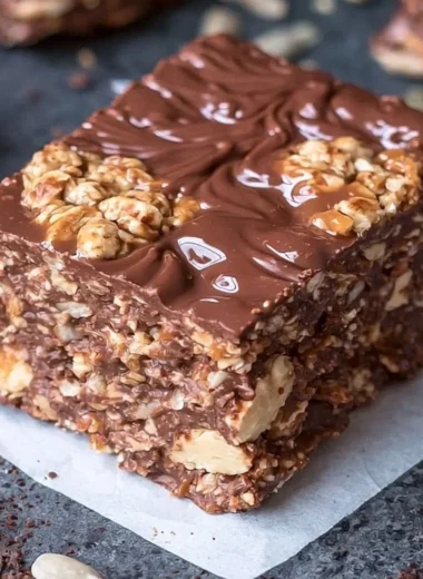 Homemade no bake keto chocolate crunch bars on a wooden table