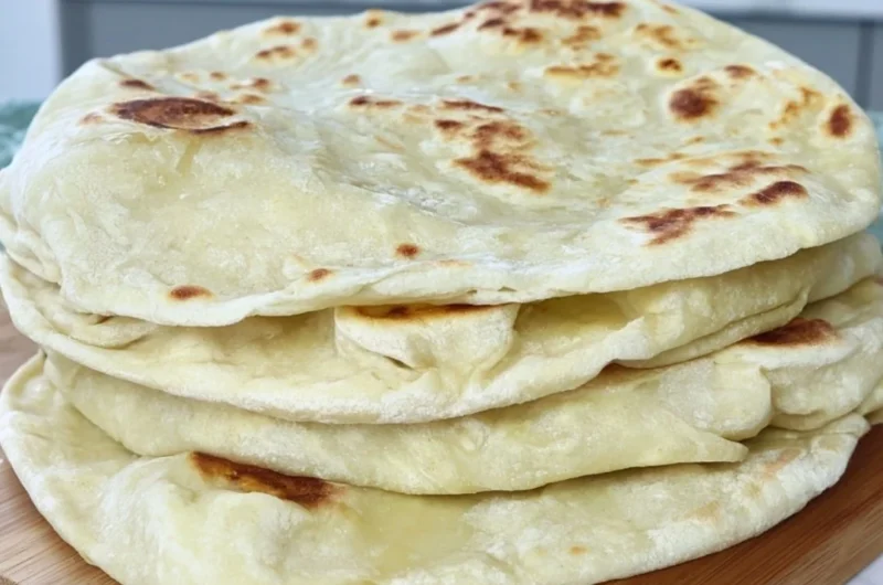 Cozy sourdough discard tortillas on a wooden board with toppings