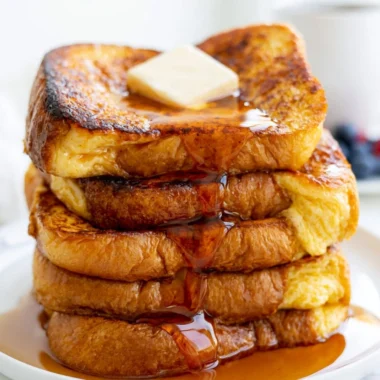 Deliciously cooked Easy French Toast with syrup and berries on a plate