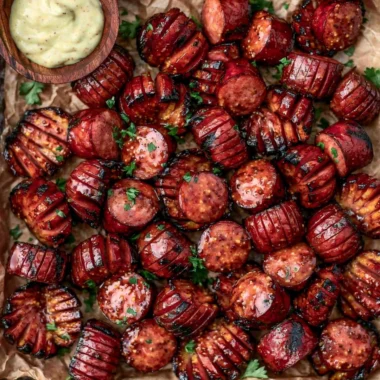 Mustard Hasselback Kielbasa Bites ready to serve as a delicious appetizer.