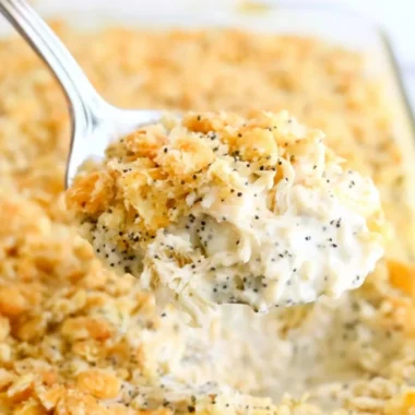 Delicious Poppy Seed Chicken Casserole topped with crunchy poppy seeds.