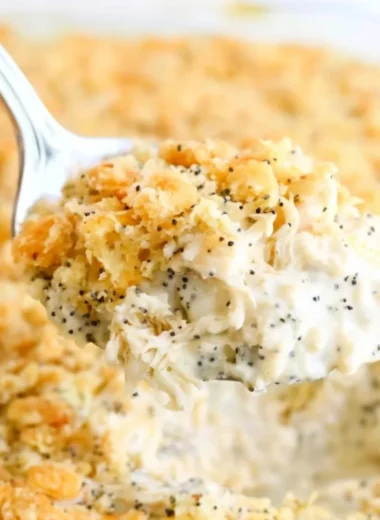 Delicious Poppy Seed Chicken Casserole topped with crunchy poppy seeds.