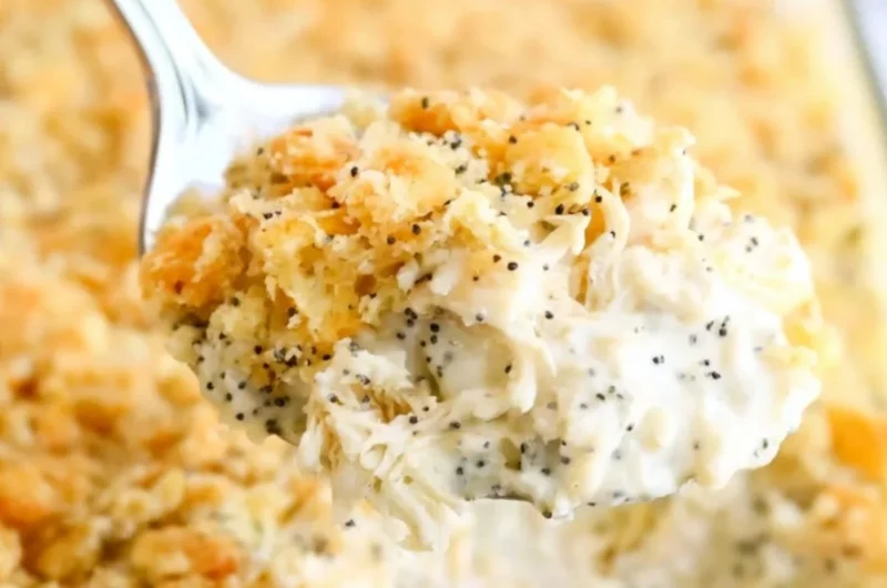 Delicious Poppy Seed Chicken Casserole topped with crunchy poppy seeds.