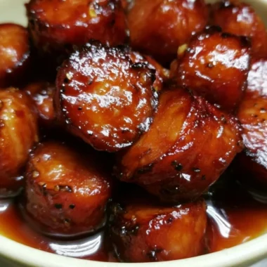 Sweet Crock Pot Kielbasa Bites served in a bowl