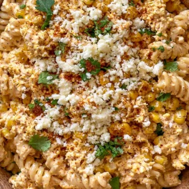 Zesty Mexican street corn chicken pasta salad in a colorful bowl