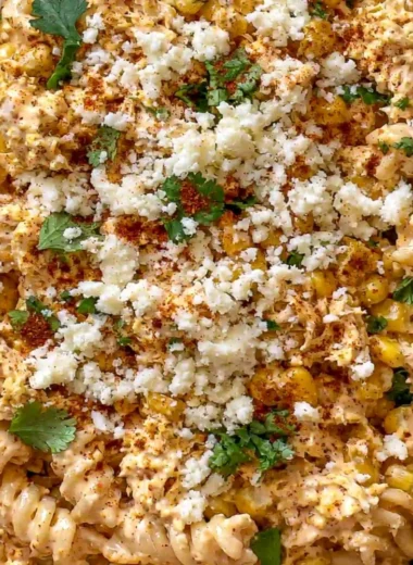Zesty Mexican street corn chicken pasta salad in a colorful bowl