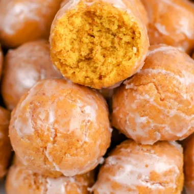 Cozy pumpkin donut holes served on a rustic plate