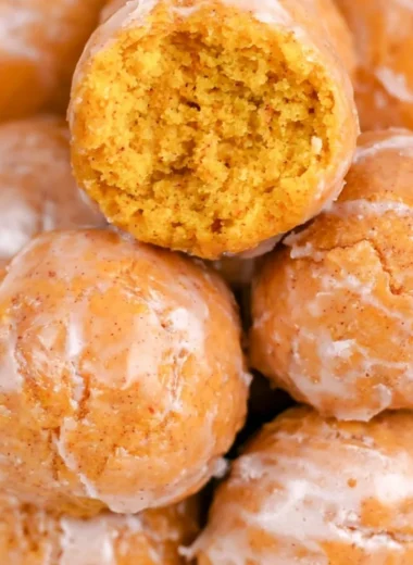 Cozy pumpkin donut holes served on a rustic plate