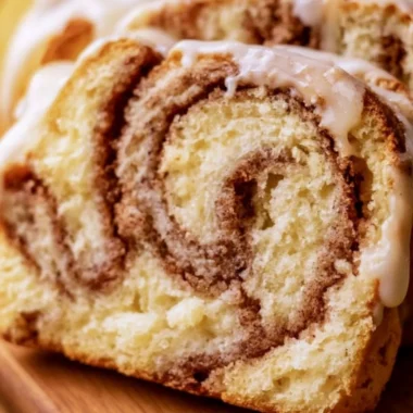 Freshly baked Dollywood cinnamon bread served warm with a sugary glaze.