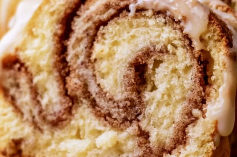 Freshly baked Dollywood cinnamon bread served warm with a sugary glaze.