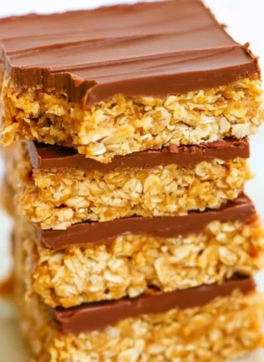 Healthy chocolate peanut butter oatmeal bars in a wooden bowl